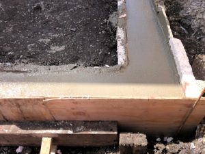 Fresh cement in the ground